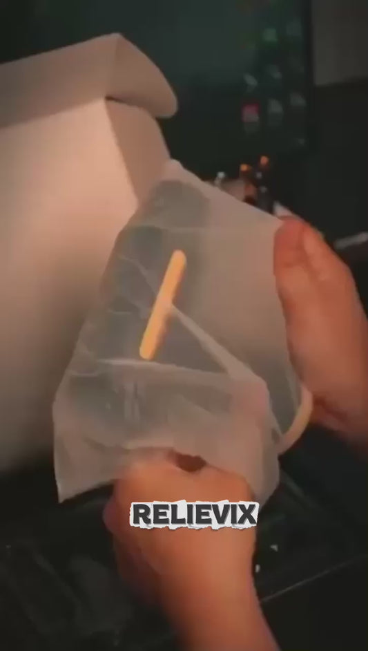 Vídeo da pistola de massagem Relievix em utilização.